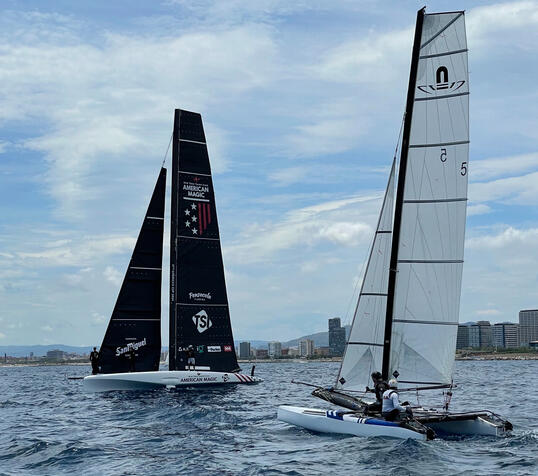 AC40 American Magic alongside a Nacra 17